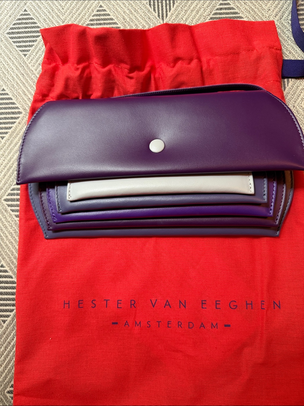 Hester Van Eeghen Purple Accordion Clutch